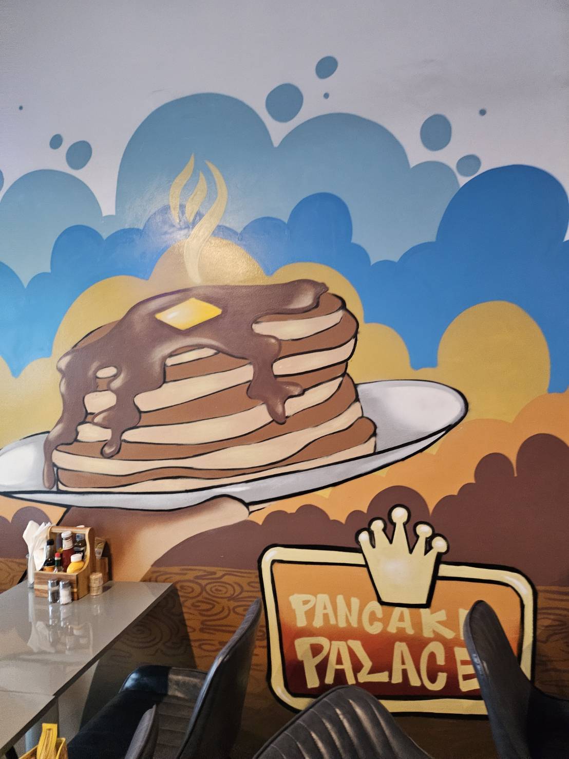 Pancake Palace mural and colourful Bangkok dining room